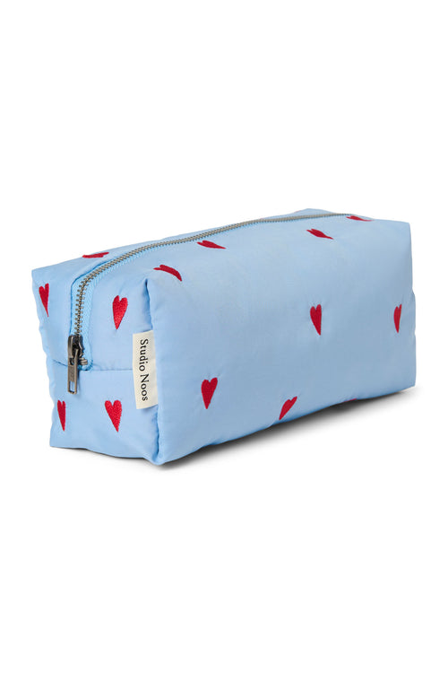 Hellblaue Puffy-Täschchen mit Herzen