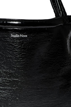 Schwarze Teddy wendbare Lack Mom Bag