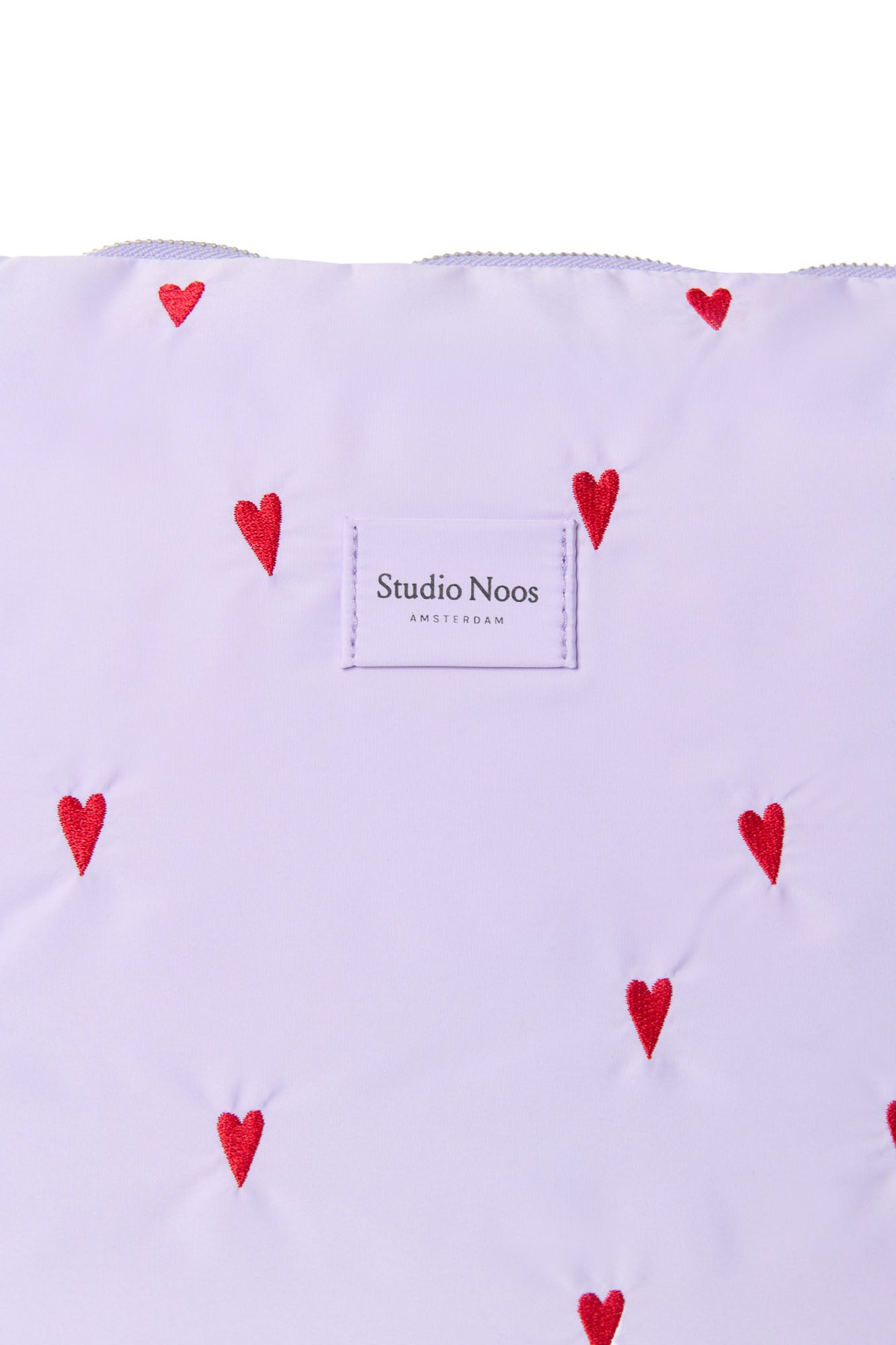 Lila Puffy-Wickeltasche mit Herzen